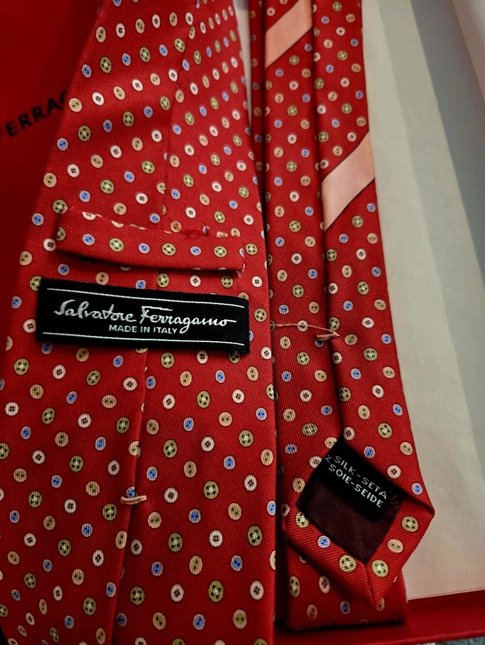 Salvatore Ferragamo Red Silk Tie with Small White and Gold Button Print